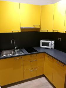 Kuchyňa alebo kuchynka v ubytovaní Apartmani Škarić