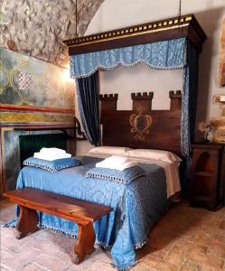 Postel nebo postele na pokoji v ubytování Agriturismo Castello Di Belforte