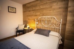 Apartamentos Pumarin客房内的一张或多张床位