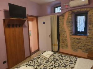 Posteľ alebo postele v izbe v ubytovaní Locanda Dalla Compagnia