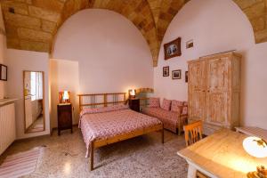 A bed or beds in a room at B&B Casa Probo