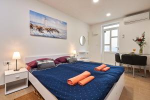 Posteľ alebo postele v izbe v ubytovaní Studio apartment Bašćan
