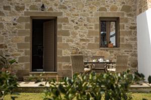 A patio or other outdoor area at Agarathos Deluxe Homes - Kaliviani -On the road to Balos