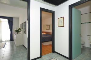 Postel nebo postele na pokoji v ubytování Casaalbergo La Rocca