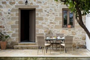 A patio or other outdoor area at Agarathos Deluxe Homes - Kaliviani -On the road to Balos