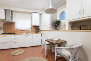 Η κουζίνα ή μικρή κουζίνα στο La Casita - centro histórico y playa +9 φωτογραφίες