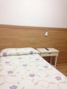 En eller flere senger på et rom på Hostal Nersan2