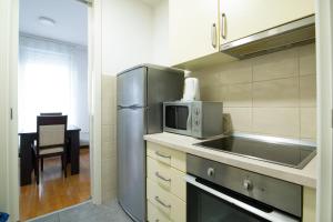 Kuchyň nebo kuchyňský kout v ubytování Apartments Belville Lux Belgrade