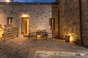 A patio or other outdoor area at Agarathos Deluxe Homes - Kaliviani -On the road to Balos