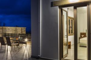 A balcony or terrace at Agarathos Deluxe Homes - Kaliviani -On the road to Balos