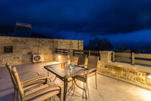 A balcony or terrace at Agarathos Deluxe Homes - Kaliviani -On the road to Balos