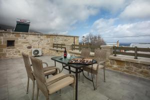 A balcony or terrace at Agarathos Deluxe Homes - Kaliviani -On the road to Balos