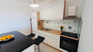 Kuchyň nebo kuchyňský kout v ubytování Apartman Petar