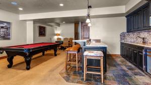 a living room with a pool table and a bar at Stillwater Shores 1273 in Heber City