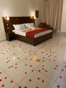 Letto o letti in una camera di Posh Hotel and Suites Victoria Island
