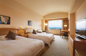 TV a/nebo společenská místnost v ubytování Royal Pines Hotel Urawa