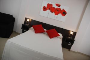 Postel nebo postele na pokoji v ubytování Hotel Polans + 23 fotografií