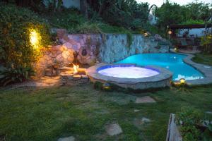 Bazén v ubytování Artistic Resort Like Home with Pool nebo v jeho okolí