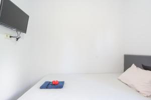 Postel nebo postele na pokoji v ubytování PAS Residence