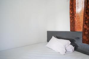 Postel nebo postele na pokoji v ubytování PAS Residence