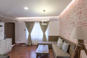 Η κουζίνα ή μικρή κουζίνα στο Uma Residency