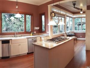 a kitchen with a stove and a counter top at Regal Victorian Home in Downtown Calistoga in Calistoga