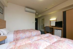 Hotel Econo Taki TV 또는 엔터테인먼트 센터
