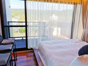 Letto o letti in una camera di Kenting Gala Vineyard