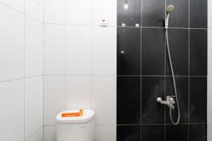 Ванна кімната в KoolKost @ Harapan Indah