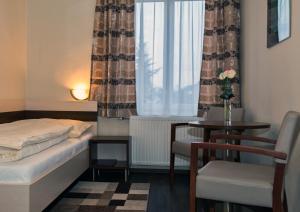 Hotel Guidassoni客房内的一张或多张床位