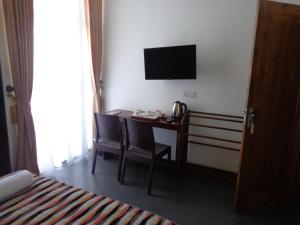 TV a/nebo společenská místnost v ubytování Hotel Star White - Negombo