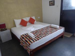 Postel nebo postele na pokoji v ubytování Hotel Star White - Negombo