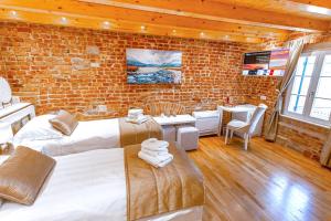 Postel nebo postele na pokoji v ubytování New Lux Villa Merissima