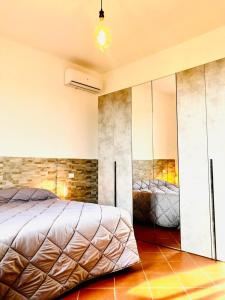 Postel nebo postele na pokoji v ubytování B&B Villa Ermanna