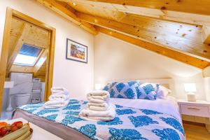Postel nebo postele na pokoji v ubytování New Lux Villa Merissima