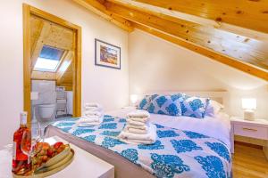 Postel nebo postele na pokoji v ubytování New Lux Villa Merissima
