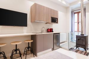 Η κουζίνα ή μικρή κουζίνα στο Aldia Suites Arachova