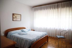 Posteľ alebo postele v izbe v ubytovaní Casa Rosa