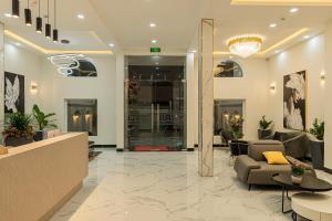 a lobby of a building with a reception desk at Yurii Hotel in Phan Thiet