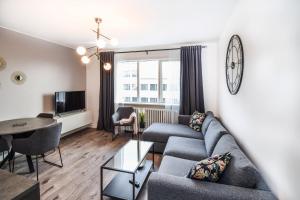 TV a/nebo společenská místnost v ubytování Greenkey Apartment S30