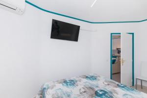 Łóżko lub łóżka w pokoju w obiekcie First line sea, luxury penthouse, sea and sunset view Vivenda Vacational Guayero 618