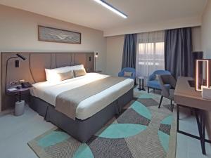 Gallery image of Hotel Holiday International in Sharjah