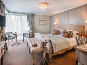 Voodi või voodid majutusasutuse Avalon House Hotel toas