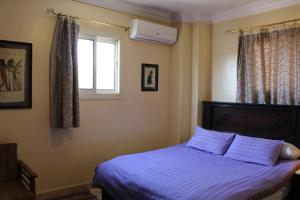 Letto o letti in una camera di Pyramids Overlook Inn
