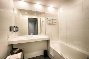 Koupelna v ubytování LOGINN Hotel Leipzig