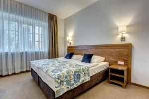Posteľ alebo postele v izbe v ubytovaní Hotel Książ