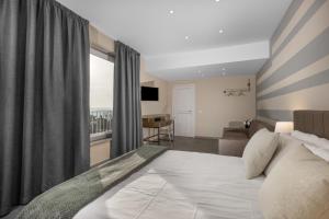 Postel nebo postele na pokoji v ubytování VIVERONE LAKE ROOMS