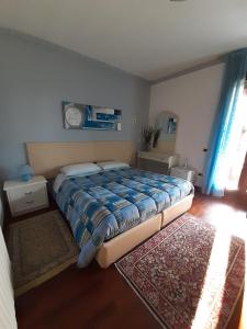 Postel nebo postele na pokoji v ubytování Le 3 Camelie Malpensa