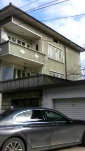 a car parked in front of a house at Aprtament 4U in Gabrovo