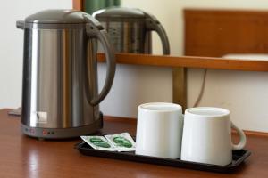 Kavos ir arbatos ruošimo rinkinys apgyvendinimo įstaigoje Plaza Hotel Premier
